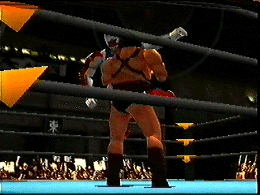 Preview image of Virtual Pro-Wrestling 2, featuring
AKI man and Executioner fighting in AKI Hall. A banner is barely visible on the left side;
this banner is not seen in the final game.
